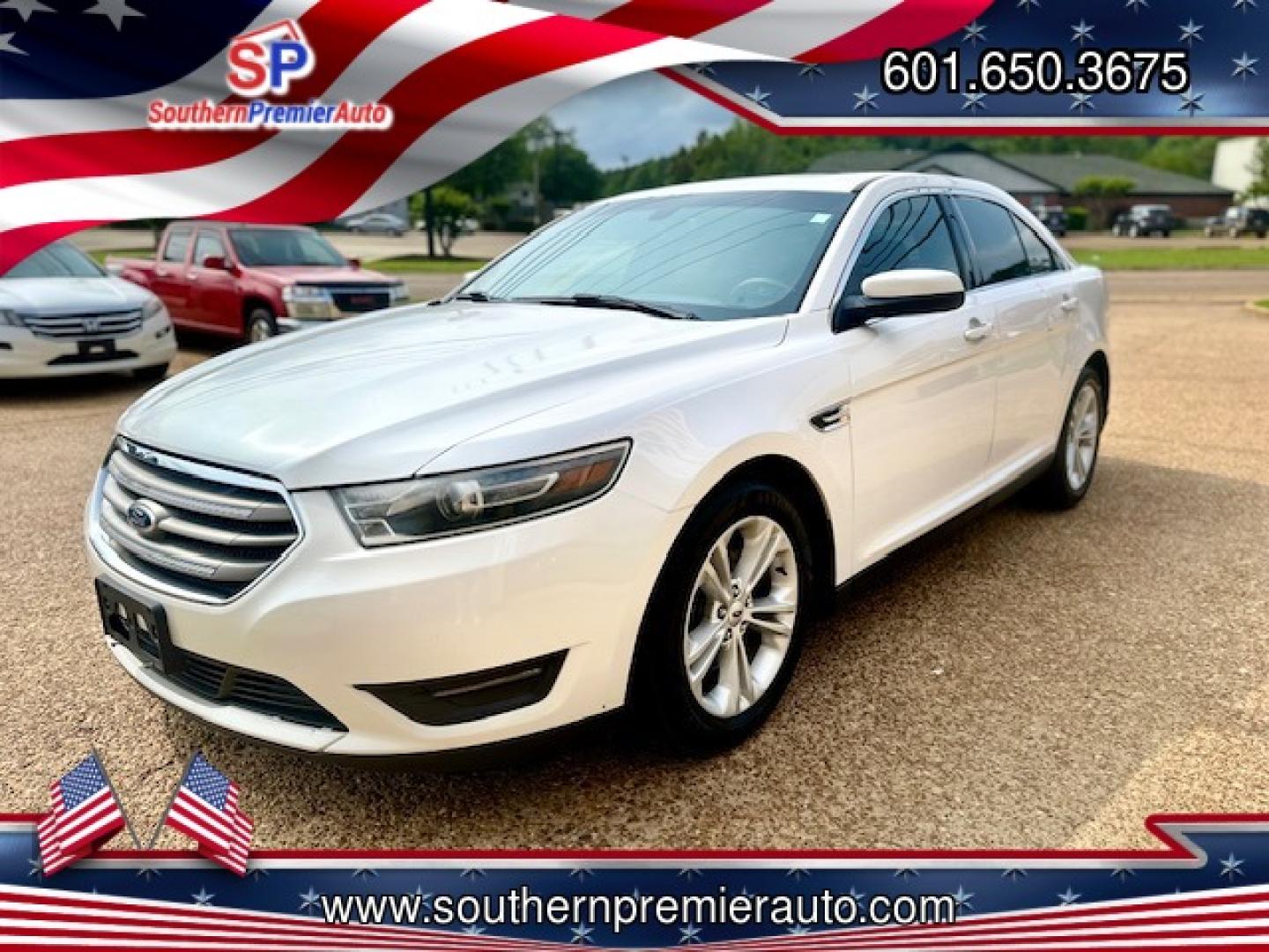 2015 WHITE FORD TAURUS SEL (1FAHP2E86FG) , located at 922 W. Beacon St., Philadelphia, MS, 39350, (601) 650-3675, 32.770447, -89.127151 - Photo#2